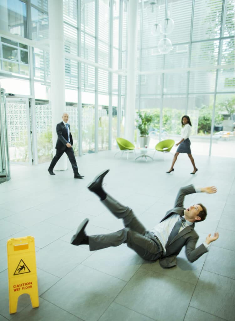 Businessman slipping on floor of office building, personal injury lawyer springfield ma