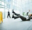 Businessman Slipping On Floor Of Office Building And Looking For Personal Injury Attorney